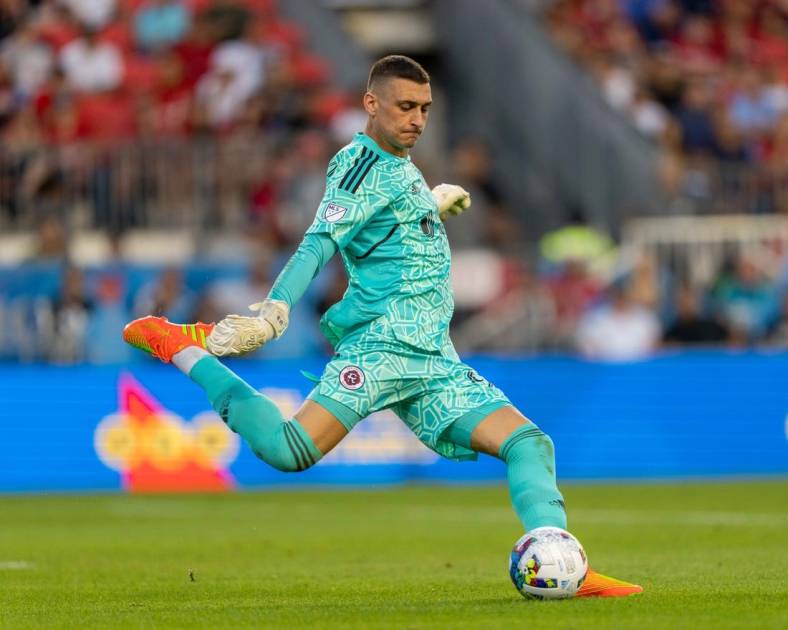 Aug 17, 2022; Toronto, Ontario, CAN; New England Revolution goalkeeper Djordje Petrovic (99) sets to take a goal kick against the Toronto FC during the first half at BMO Field. Mandatory Credit: Kevin Sousa-USA TODAY Sports