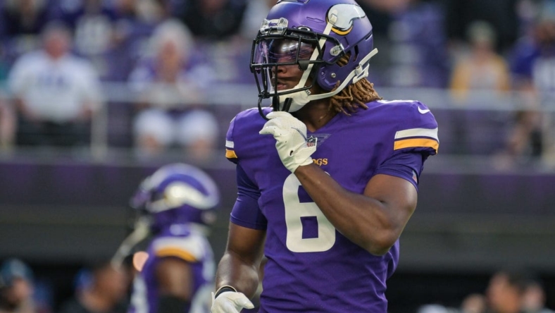 Vikings first-round pick Lewis Cine (leg) carted off vs. Saints