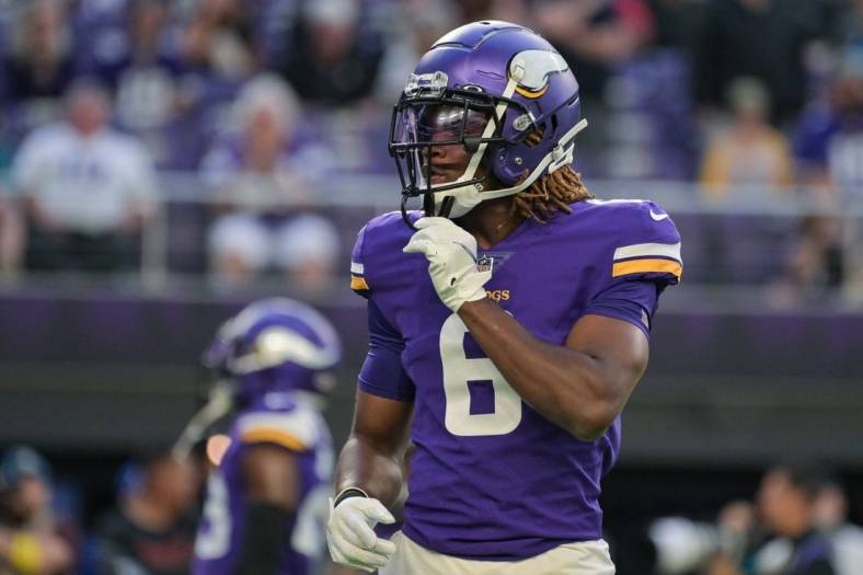 Aug 20, 2022; Minneapolis, Minnesota, USA; Minnesota Vikings safety Lewis Cine (6) warms up before the game against the San Francisco 49ers at U.S. Bank Stadium. Mandatory Credit: Jeffrey Becker-USA TODAY Sports