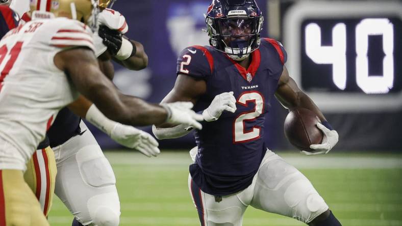 Aug 25, 2022; Houston, Texas, USA; Houston Texans running back Marlon Mack (2) runs with the ball during the third quarter against the San Francisco 49ers at NRG Stadium. Mandatory Credit: Troy Taormina-USA TODAY Sports