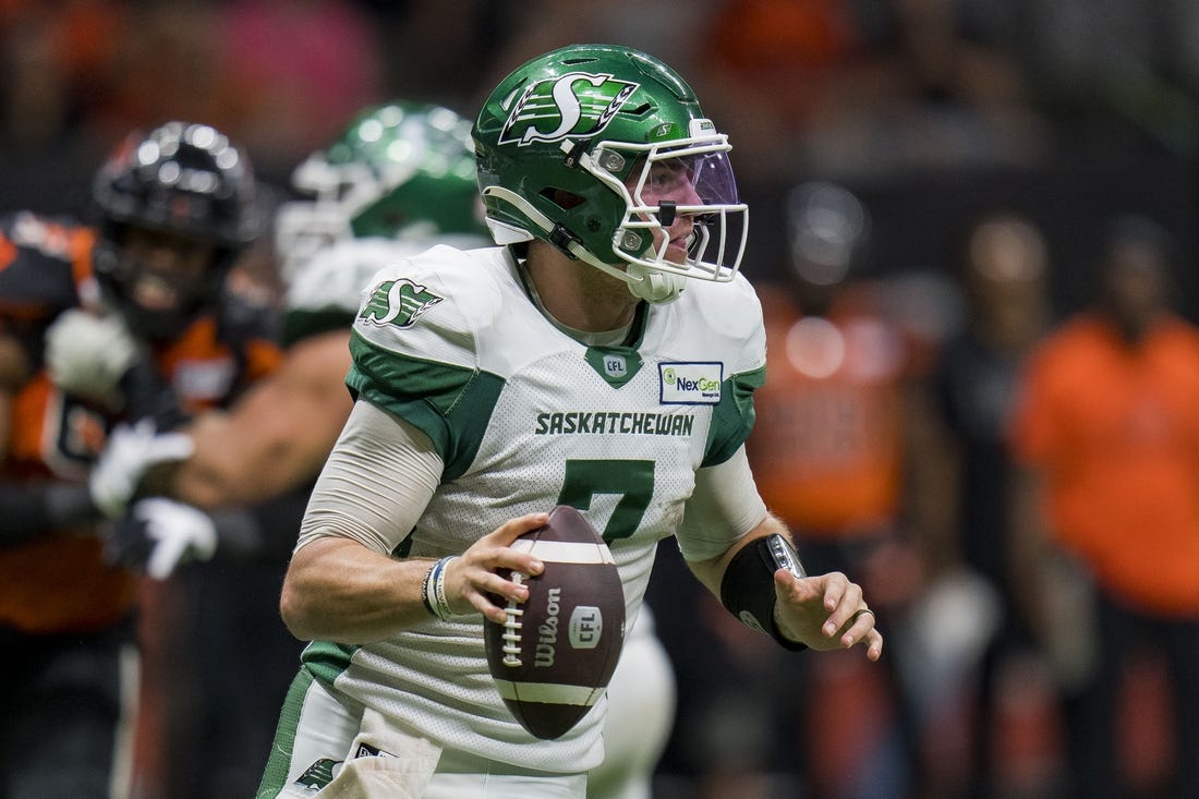 Aug 26, 2022; Vancouver, British Columbia, CAN; Saskatchewan Roughriders quarterback Cody Fajardo (7) looks to pass against the BC Lions in the second half at BC Place. Mandatory Credit: Bob Frid-USA TODAY Sports