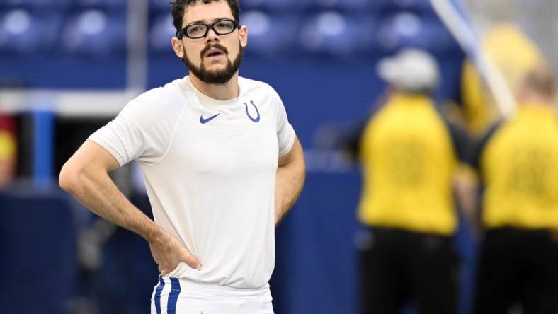 Aug 27, 2022; Indianapolis, Indiana, USA; Indianapolis Colts Rodrigo Blankenship (3) stretches on the field before the game against the Tampa Bay Buccaneers at Lucas Oil Stadium. Mandatory Credit: Marc Lebryk-USA TODAY Sports