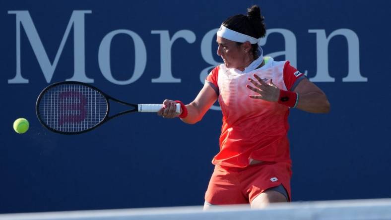 Aug 29, 2022; Flushing, NY, USA; Ons Jabeur of Tunisia hits a shot against Madison Brengle of the United States on day one of the 2022 U.S. Open tennis tournament at USTA Billie Jean King National Tennis Center. Mandatory Credit: Jerry Lai-USA TODAY Sports