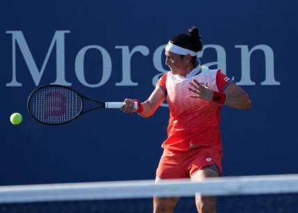 Aug 29, 2022; Flushing, NY, USA; Ons Jabeur of Tunisia hits a shot against Madison Brengle of the United States on day one of the 2022 U.S. Open tennis tournament at USTA Billie Jean King National Tennis Center. Mandatory Credit: Jerry Lai-USA TODAY Sports