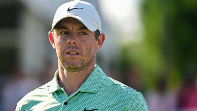 Aug 28, 2022; Atlanta, Georgia, USA; Rory McIlroy looks at the leaderboard on the 17th hole during the final round of the TOUR Championship golf tournament. Mandatory Credit: Adam Hagy-USA TODAY Sports