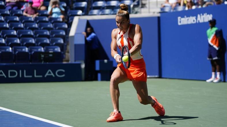 Aug 31, 2022; Flushing, NY, USA; Maria Sakkari of Greece hits to Xiyu Wang of China on day three of the 2022 U.S. Open tennis tournament at USTA Billie Jean King Tennis Center. Mandatory Credit: Danielle Parhizkaran-USA TODAY Sports