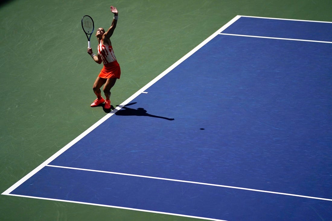 Aug 31, 2022; Flushing, NY, USA; Maria Sakkari of Greece serves to Xiyu Wang of China on day three of the 2022 U.S. Open tennis tournament at USTA Billie Jean King Tennis Center. Mandatory Credit: Danielle Parhizkaran-USA TODAY Sports