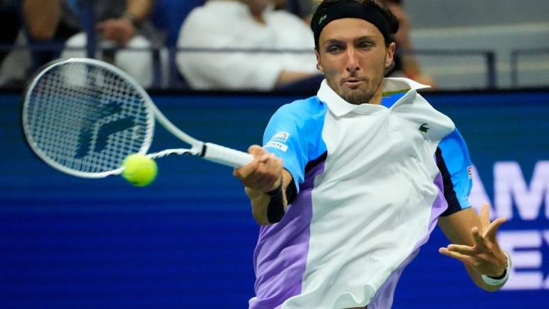 Aug 31, 2022; Flushing, NY, USA;   Arthur Rinderknech of France hits to Daniil Medvedev on day three of the 2022 U.S. Open tennis tournament at USTA Billie Jean King National Tennis Center. Mandatory Credit: Robert Deutsch-USA TODAY Sports