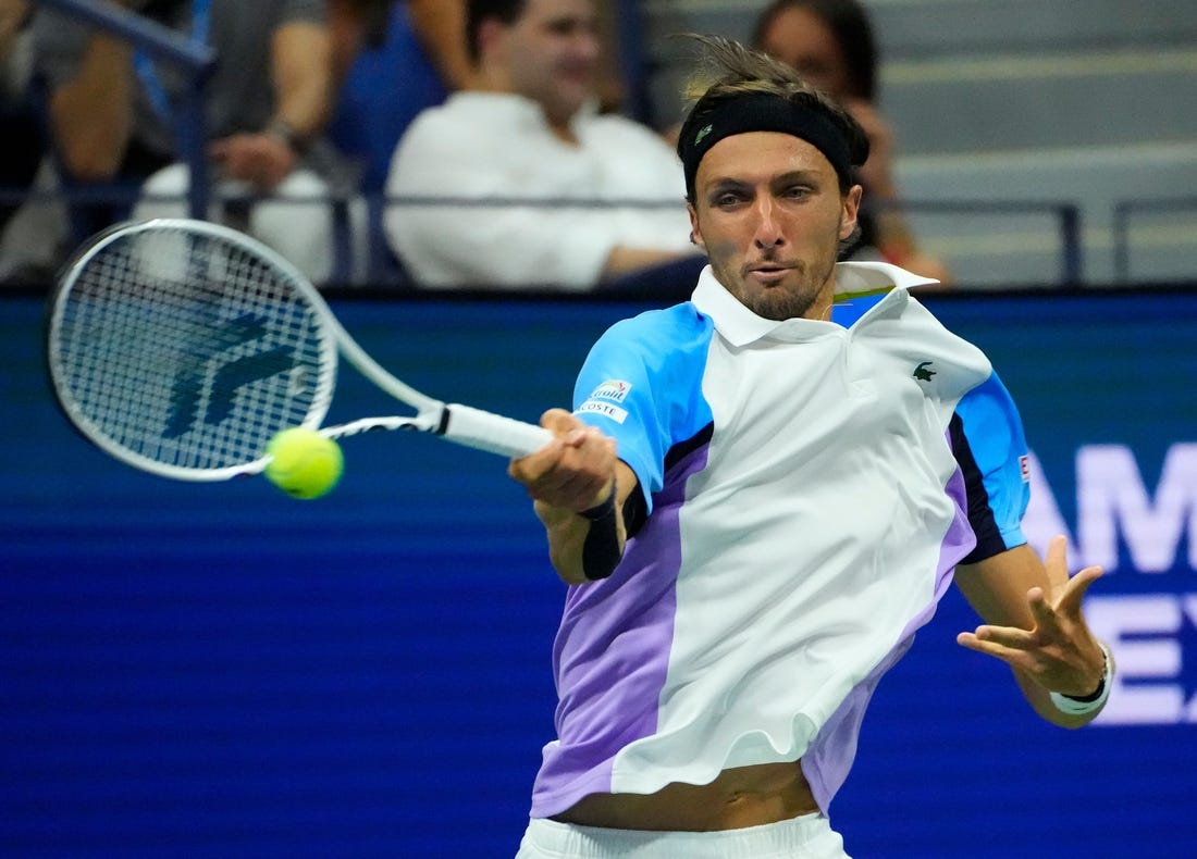 Aug 31, 2022; Flushing, NY, USA;   Arthur Rinderknech of France hits to Daniil Medvedev on day three of the 2022 U.S. Open tennis tournament at USTA Billie Jean King National Tennis Center. Mandatory Credit: Robert Deutsch-USA TODAY Sports