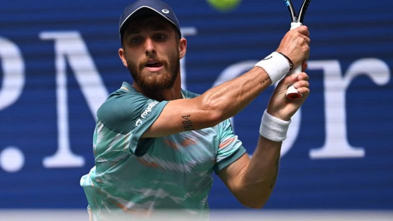 Sept 4, 2022; Flushing, NY, USA;  Corentin Moutet of France hits to Casper Ruud of Norway on day seven of the 2022 U.S. Open tennis tournament at USTA Billie Jean King National Tennis Center. Mandatory Credit: Robert Deutsch-USA TODAY Sports