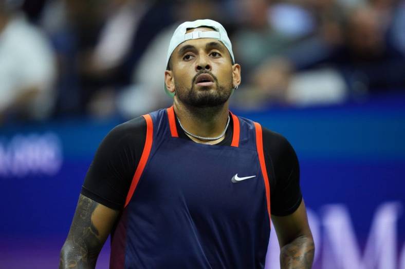Sep 6, 2022; Flushing, NY, USA; Nick Kyrgios of Australia reacts during a match against Karen Khachanov (not pictured) on day nine of the 2022 U.S. Open tennis tournament at USTA Billie Jean King Tennis Center. Mandatory Credit: Danielle Parhizkaran-USA TODAY Sports