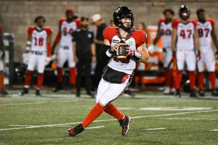 Sep 2, 2022; Montreal, Quebec, CAN; Ottawa Redblacks quarterback Nick Arbuckle (19) against the Montreal Alouettes during the first quarter at Percival Molson Memorial Stadium. Mandatory Credit: David Kirouac-USA TODAY Sports