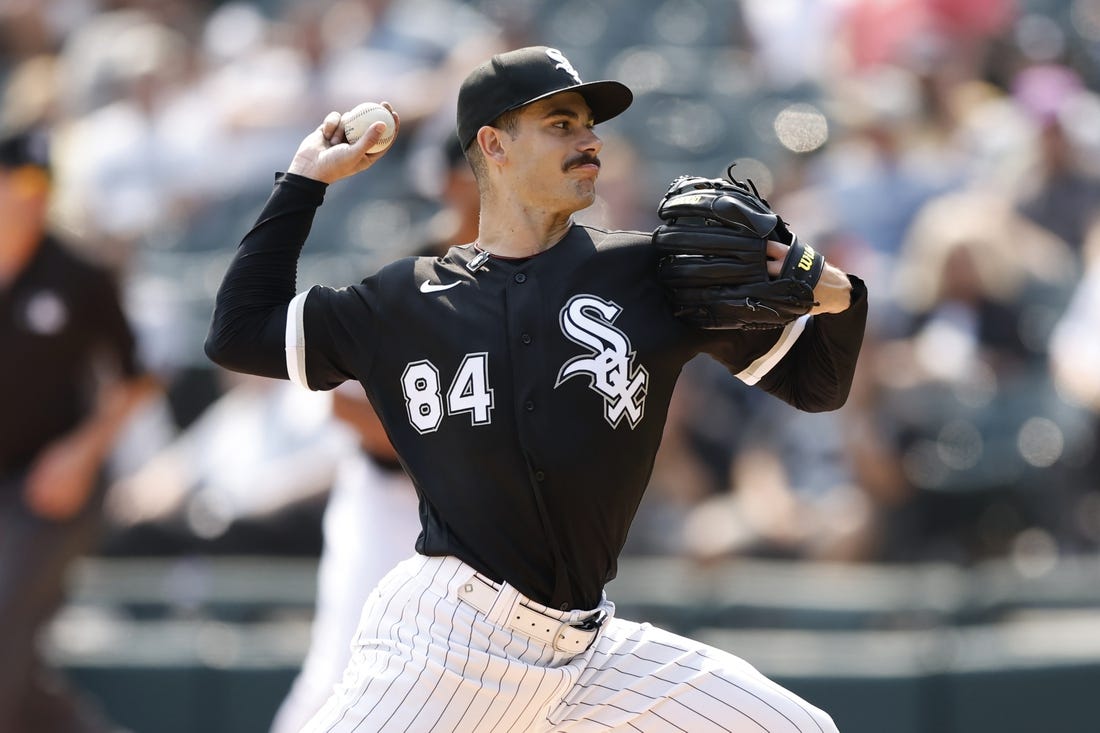 Sep 14, 2022; Chicago, Illinois, USA; Chicago White Sox starting pitcher Dylan Cease (84) delivers against the Colorado Rockies during the second inning at Guaranteed Rate Field. Mandatory Credit: Kamil Krzaczynski-USA TODAY Sports