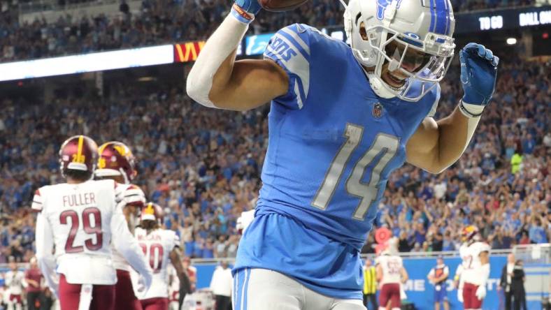 Detroit Lions wide receiver Amon-Ra St. Brown celebrates his touchdown catch against the Washington Commanders during the first half at Ford Field, Sept. 18, 2022.

Nfl Washington Commanders At Detroit Lions