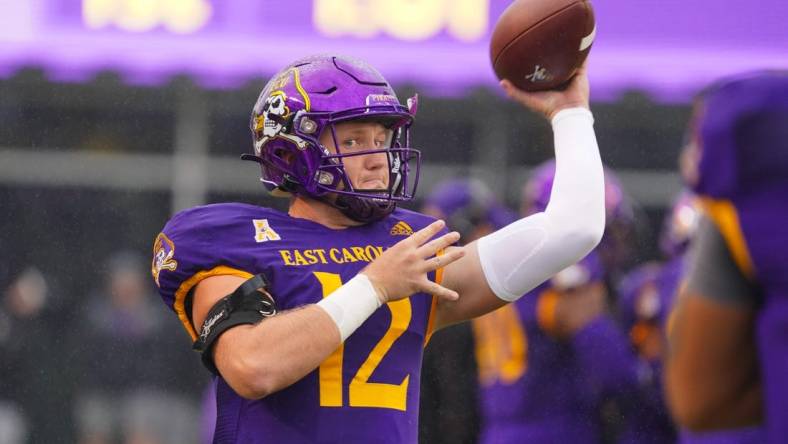 Sep 10, 2022; Greenville, North Carolina, USA;  East Carolina Pirates quarterback Holton Ahlers (12) throws the ball against the Old Dominion Monarchs before the game at Dowdy-Ficklen Stadium. Mandatory Credit: James Guillory-USA TODAY Sports