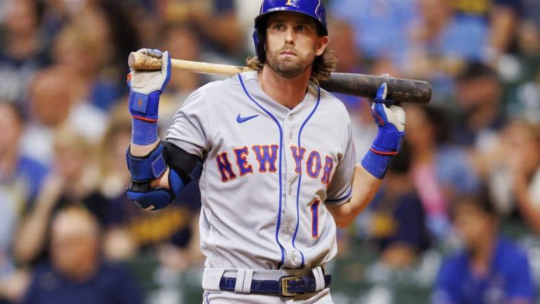 Sep 20, 2022; Milwaukee, Wisconsin, USA;  New York Mets right fielder Jeff McNeil (1) reacts after striking out during the sixth inning against the Milwaukee Brewers at American Family Field. Mandatory Credit: Jeff Hanisch-USA TODAY Sports