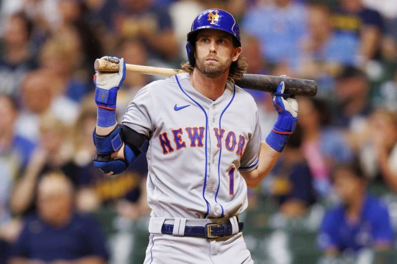 Sep 20, 2022; Milwaukee, Wisconsin, USA;  New York Mets right fielder Jeff McNeil (1) reacts after striking out during the sixth inning against the Milwaukee Brewers at American Family Field. Mandatory Credit: Jeff Hanisch-USA TODAY Sports