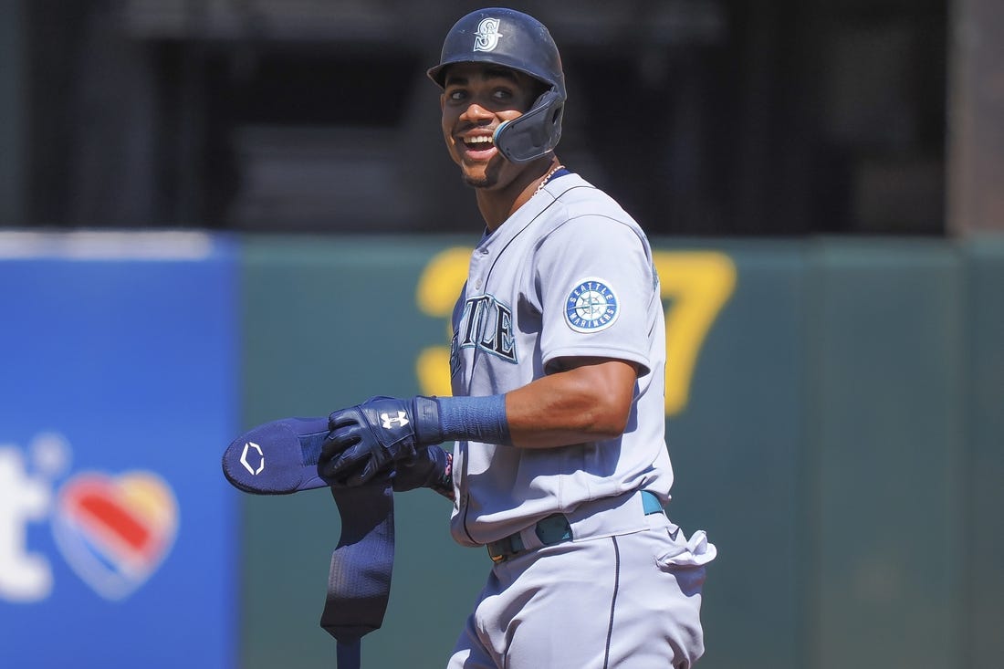 Sep 22, 2022; Oakland, California, USA; Seattle Mariners center fielder Julio Rodriguez (44) reacts after hitting a double against the Oakland Athletics during the first inning at RingCentral Coliseum. Mandatory Credit: Kelley L Cox-USA TODAY Sports