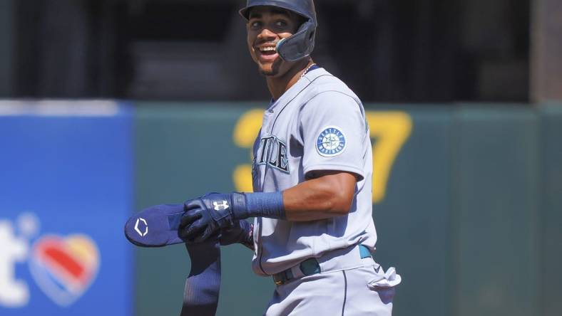 Sep 22, 2022; Oakland, California, USA; Seattle Mariners center fielder Julio Rodriguez (44) reacts after hitting a double against the Oakland Athletics during the first inning at RingCentral Coliseum. Mandatory Credit: Kelley L Cox-USA TODAY Sports