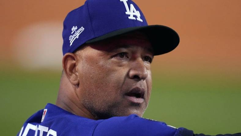 Sep 22, 2022; Los Angeles, California, USA; Los Angeles Dodgers manager Dave Roberts (30) reacts in the third inning against the Arizona Diamondbacks at Dodger Stadium. Mandatory Credit: Kirby Lee-USA TODAY Sports