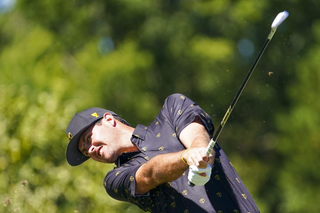 Sep 23, 2022; Charlotte, North Carolina, USA; International Team golfer Mito Pereira celebrates hits his tee shot on the fourth hole during the four-ball match play of the Presidents Cup golf tournament at Quail Hollow Club. Mandatory Credit: Peter Casey-USA TODAY Sports