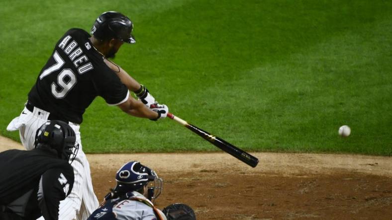 Sep 23, 2022; Chicago, Illinois, USA; Chicago White Sox first baseman Jose Abreu (79) hits an RBI single during the third inning against the Detroit Tigers at Guaranteed Rate Field. Mandatory Credit: Matt Marton-USA TODAY Sports