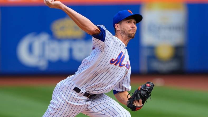 Sep 18, 2022; New York City, New York, USA; New York Mets pitcher Jacob DeGrom (48) delivers a pitch against the Pittsburgh Pirates during the first inning at Citi Field. Mandatory Credit: Gregory Fisher-USA TODAY Sports