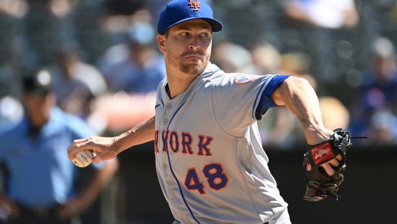 Sep 24, 2022; Oakland, California, USA; New York Mets starting pitcher Jacob deGrom (48) throws a pitch against the Oakland Athletics during the first inning at RingCentral Coliseum. Mandatory Credit: Robert Edwards-USA TODAY Sports