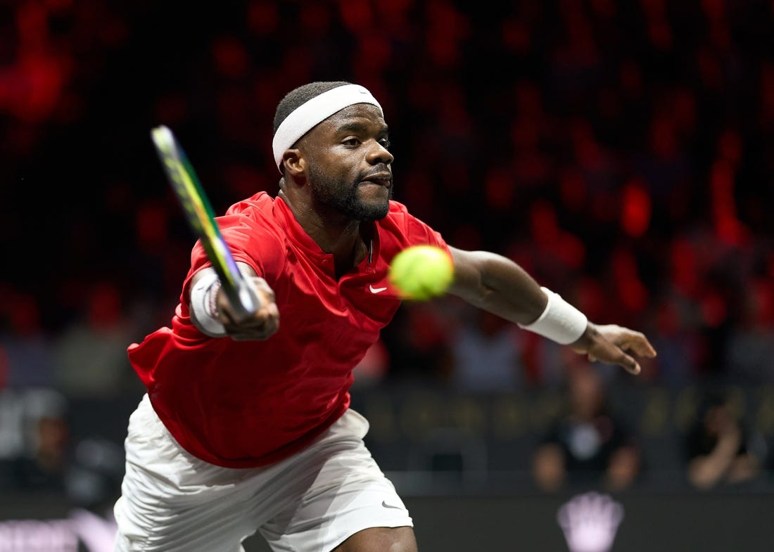 Sep 24, 2022; London, United Kingdom;
Frances Tiafoe (USA) plays a shot against Novak Djokovic (SRB) in a Laver Cup singles match.  Mandatory Credit: Peter van den Berg-USA TODAY Sports