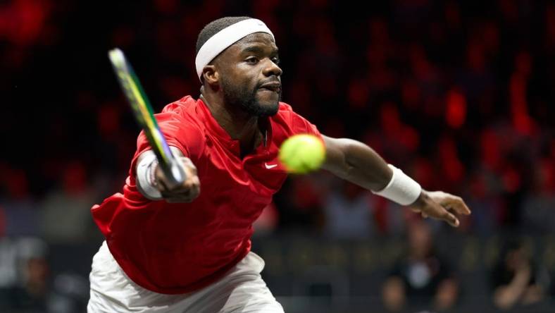 Sep 24, 2022; London, United Kingdom;
Frances Tiafoe (USA) plays a shot against Novak Djokovic (SRB) in a Laver Cup singles match.  Mandatory Credit: Peter van den Berg-USA TODAY Sports