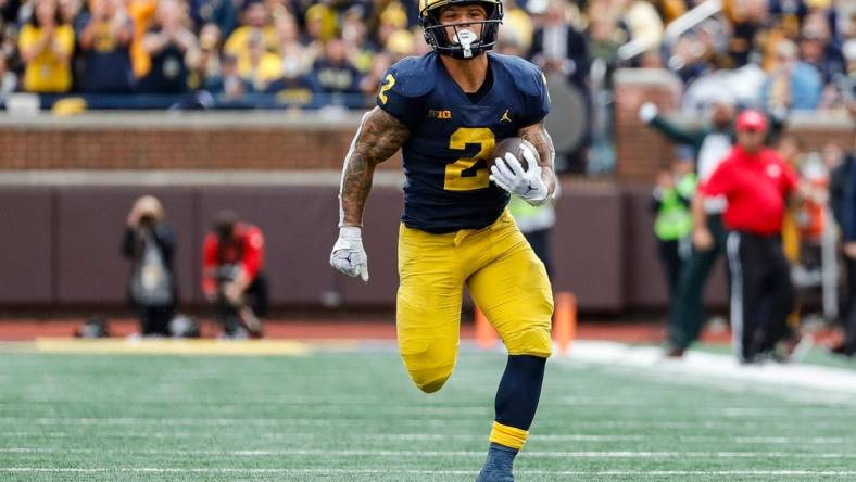 Michigan running back Blake Corum runs for a touchdown against Maryland during the second half at Michigan Stadium in Ann Arbor on Saturday, Sept. 24, 2022.