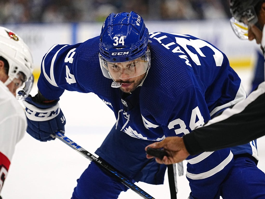 Sep 24, 2022; Toronto, Ontario, CAN; Toronto Maple Leafs forward Auston Matthews (34) keeps his eye on the puck before a face off against the Ottawa Senators during the second period at Scotiabank Arena. Mandatory Credit: John E. Sokolowski-USA TODAY Sports