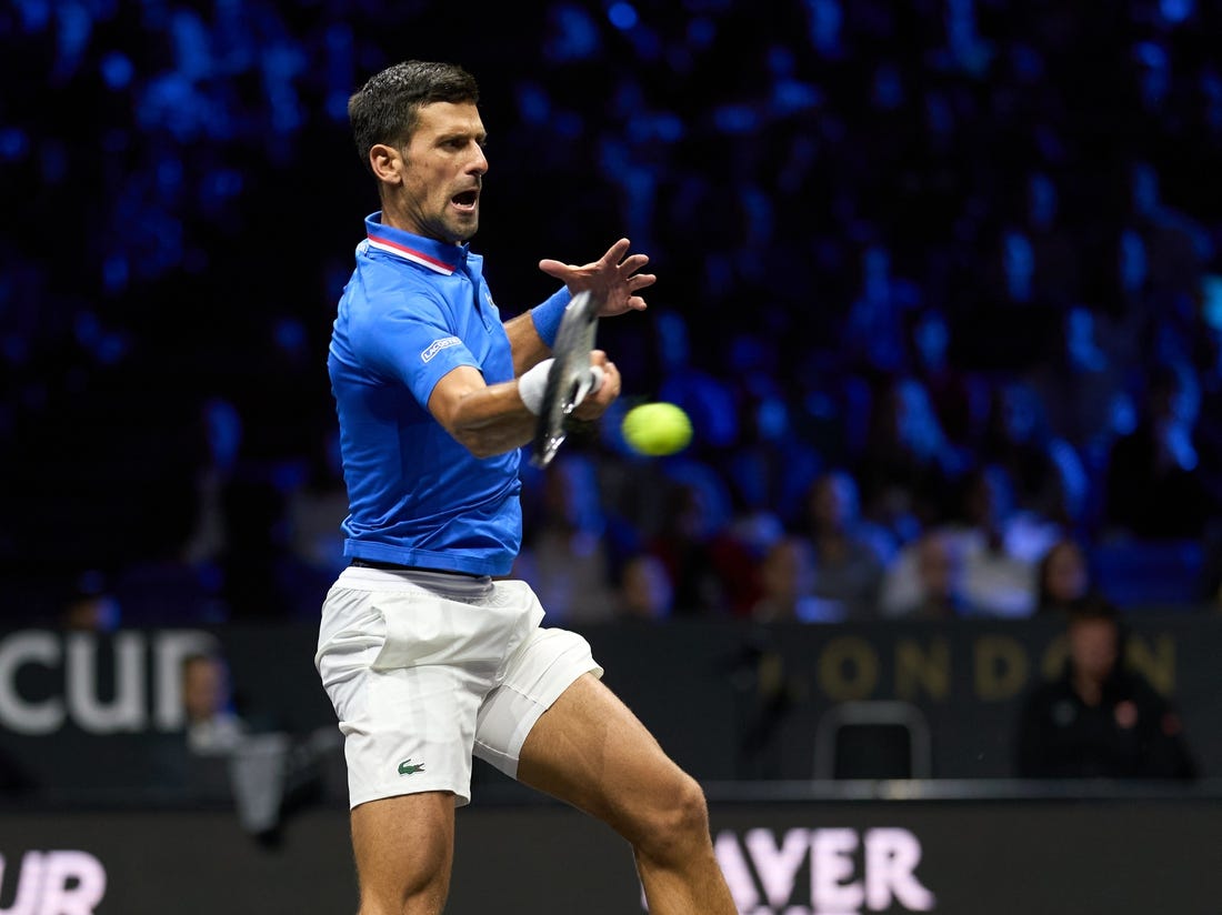 Sep 25, 2022; London, United Kingdom; Novak Djokovic (SRB) plays a shot against Felix Auger-Aliassime (CAN) in Lavers Cup singles. Mandatory Credit: Peter van den Berg-USA TODAY Sports