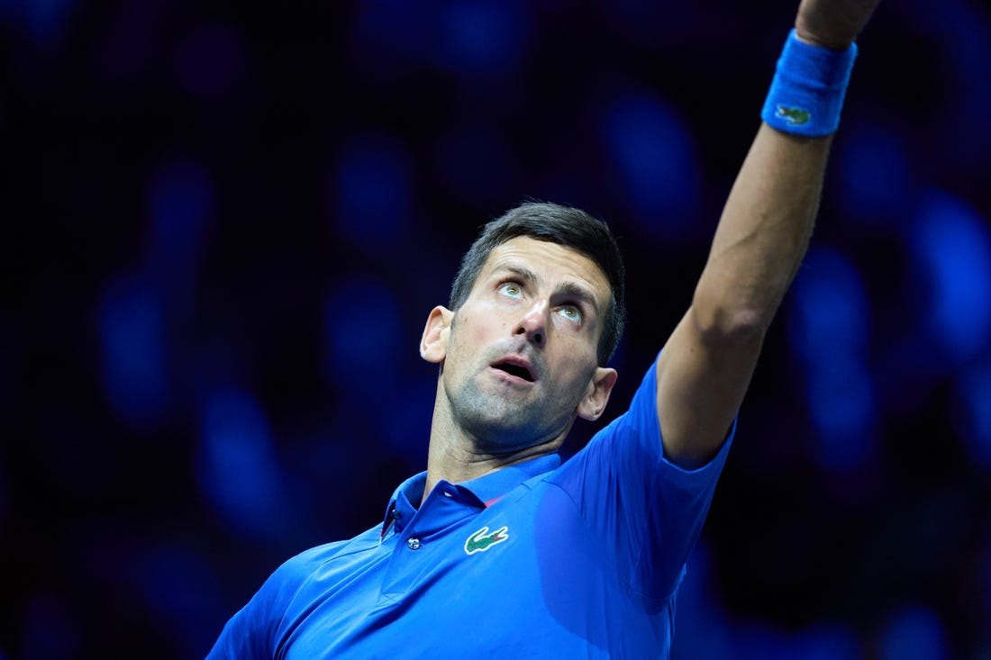 Sep 25, 2022; London, United Kingdom; Novak Djokovic (SRB) serves against Felix Auger-Aliassime (CAN) in Lavers Cup singles. Mandatory Credit: Peter van den Berg-USA TODAY Sports