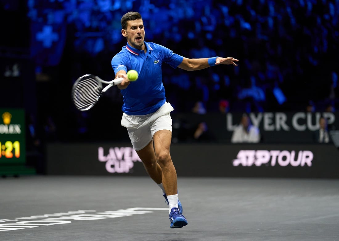 Sep 25, 2022; London, United Kingdom; Novak Djokovic (SRB) plays a shot against Felix Auger-Aliassime (CAN) in Lavers Cup singles. Mandatory Credit: Peter van den Berg-USA TODAY Sports