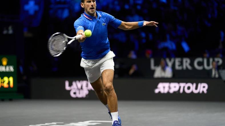 Sep 25, 2022; London, United Kingdom; Novak Djokovic (SRB) plays a shot against Felix Auger-Aliassime (CAN) in Lavers Cup singles. Mandatory Credit: Peter van den Berg-USA TODAY Sports