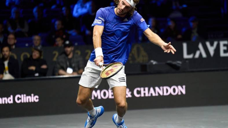 Sep 25, 2022; London, United Kingdom; Stefanos Tsitsipas (GRE) plays a shot against Frances Tiafoe (USA) in Lavers Cup singles. Mandatory Credit: Peter van den Berg-USA TODAY Sports