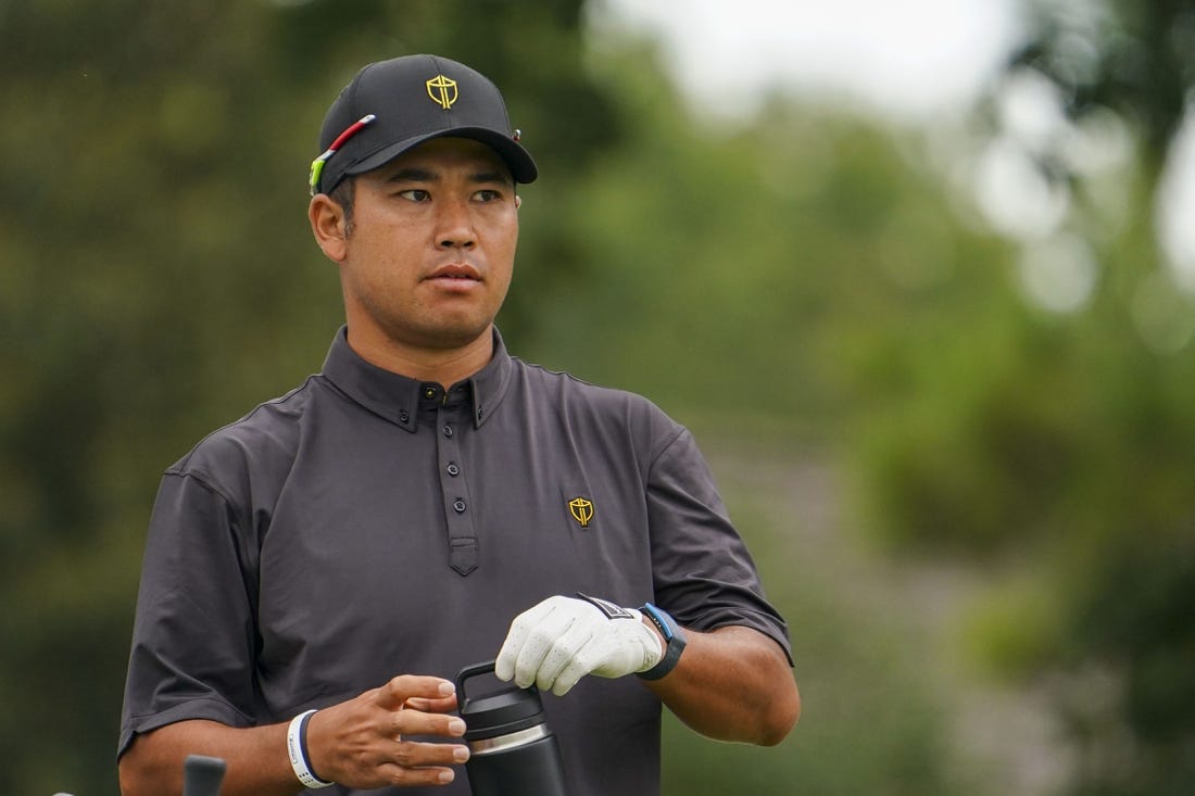 Sep 25, 2022; Charlotte, North Carolina, USA; International Team golfer Hideki Matsuyama stands on the fifth tee during the singles match play of the Presidents Cup golf tournament at Quail Hollow Club. Mandatory Credit: Peter Casey-USA TODAY Sports