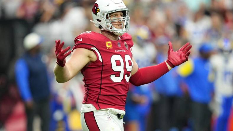 Sep 25, 2022; Glendale, Arizona, USA; Arizona Cardinals defensive end J.J. Watt (99) celebrates a sack against the Los Angeles Rams during the second half at State Farm Stadium. Mandatory Credit: Joe Camporeale-USA TODAY Sports