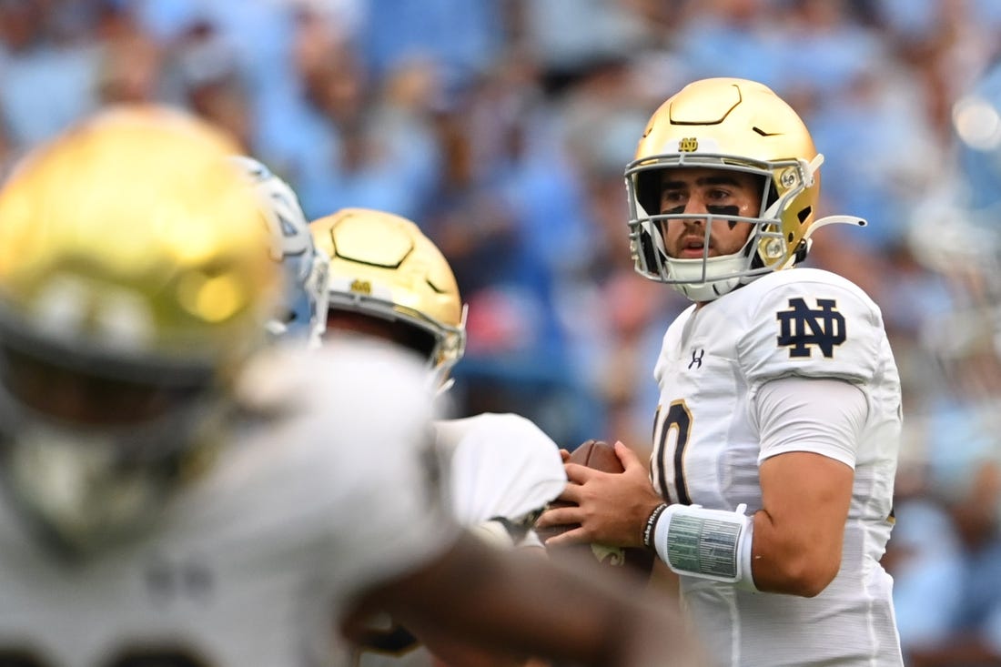 Sep 24, 2022; Chapel Hill, North Carolina, USA; Notre Dame Fighting Irish quarterback Drew Pyne (10) looks to pass in the second quarter at Kenan Memorial Stadium. Mandatory Credit: Bob Donnan-USA TODAY Sports