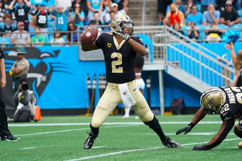 Sep 25, 2022; Charlotte, North Carolina, USA;  New Orleans Saints quarterback Jameis Winston (2) goes back to pass against the Carolina Panthers during the second half at Bank of America Stadium. Mandatory Credit: James Guillory-USA TODAY Sports