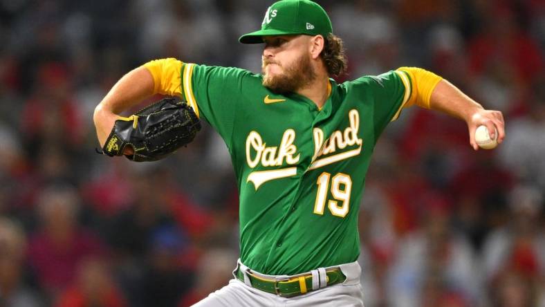 Sep 29, 2022; Anaheim, California, USA;  Oakland Athletics starting pitcher Cole Irvin (19) throws to the plate in the third inning against the Los Angeles Angels at Angel Stadium. Mandatory Credit: Jayne Kamin-Oncea-USA TODAY Sports