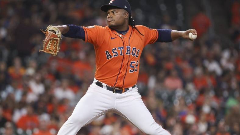 Sep 30, 2022; Houston, Texas, USA; Houston Astros starting pitcher Framber Valdez (59) delivers a pitch during the first inning against the Tampa Bay Rays at Minute Maid Park. Mandatory Credit: Troy Taormina-USA TODAY Sports