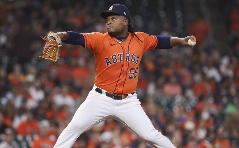 Sep 30, 2022; Houston, Texas, USA; Houston Astros starting pitcher Framber Valdez (59) delivers a pitch during the first inning against the Tampa Bay Rays at Minute Maid Park. Mandatory Credit: Troy Taormina-USA TODAY Sports