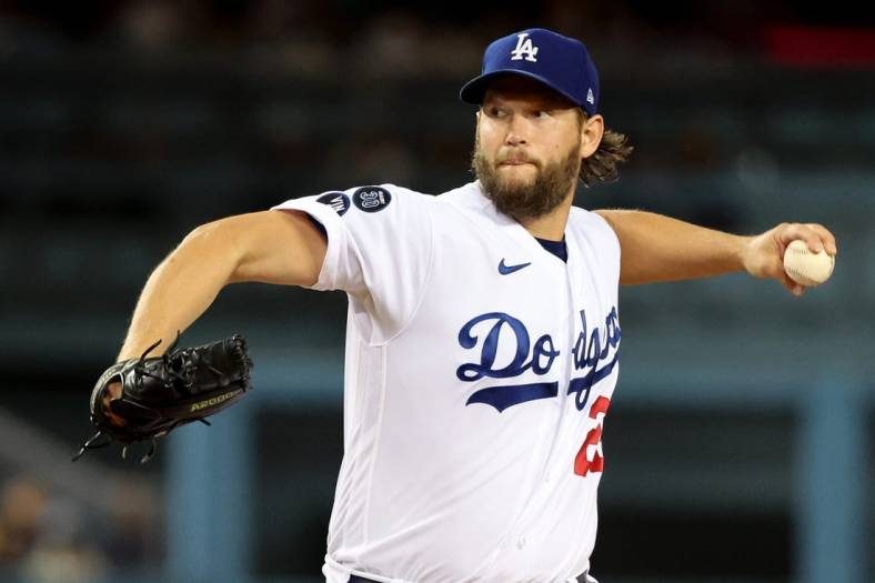 Sep 30, 2022; Los Angeles, California, USA;  Los Angeles Dodgers starting pitcher Clayton Kershaw (22) pitches during the first inning against the Colorado Rockies at Dodger Stadium. Mandatory Credit: Kiyoshi Mio-USA TODAY Sports