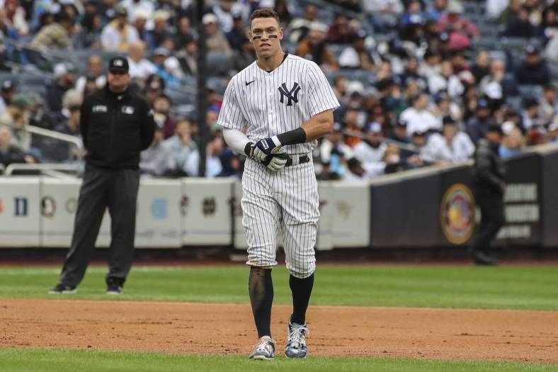 Oct 1, 2022; Bronx, New York, USA; New York Yankees right fielder Aaron Judge (99) on the field in between innings against the Baltimore Orioles at Yankee Stadium. Mandatory Credit: Wendell Cruz-USA TODAY Sports