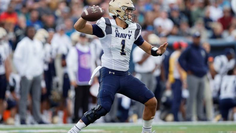 Oct 1, 2022; Colorado Springs, Colorado, USA; Navy Midshipmen quarterback Tai Lavatai (1) looks to pass in the fourth quarter against the Air Force Falcons at Falcon Stadium. Mandatory Credit: Isaiah J. Downing-USA TODAY Sports