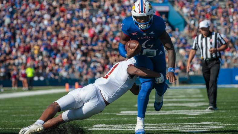 Oct 1, 2022; Lawrence, Kansas, USA; Kansas Jayhawks quarterback Jalon Daniels (6) heads towards the end zone during the second quarter against the Iowa State Cyclones at David Booth Kansas Memorial Stadium. Mandatory Credit: William Purnell-USA TODAY Sports