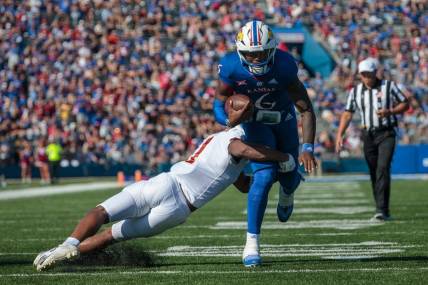 Oct 1, 2022; Lawrence, Kansas, USA; Kansas Jayhawks quarterback Jalon Daniels (6) heads towards the end zone during the second quarter against the Iowa State Cyclones at David Booth Kansas Memorial Stadium. Mandatory Credit: William Purnell-USA TODAY Sports