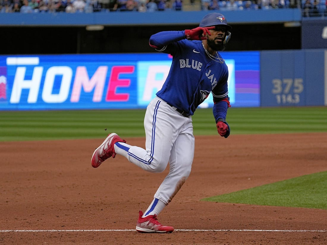 Oct 1, 2022; Toronto, Ontario, CAN; Toronto Blue Jays right fielder Teoscar Hernandez (37) celebrates as he rounds the bases after his solo home run against the Boston Red Sox during the fifth inning at Rogers Centre. Mandatory Credit: John E. Sokolowski-USA TODAY Sports